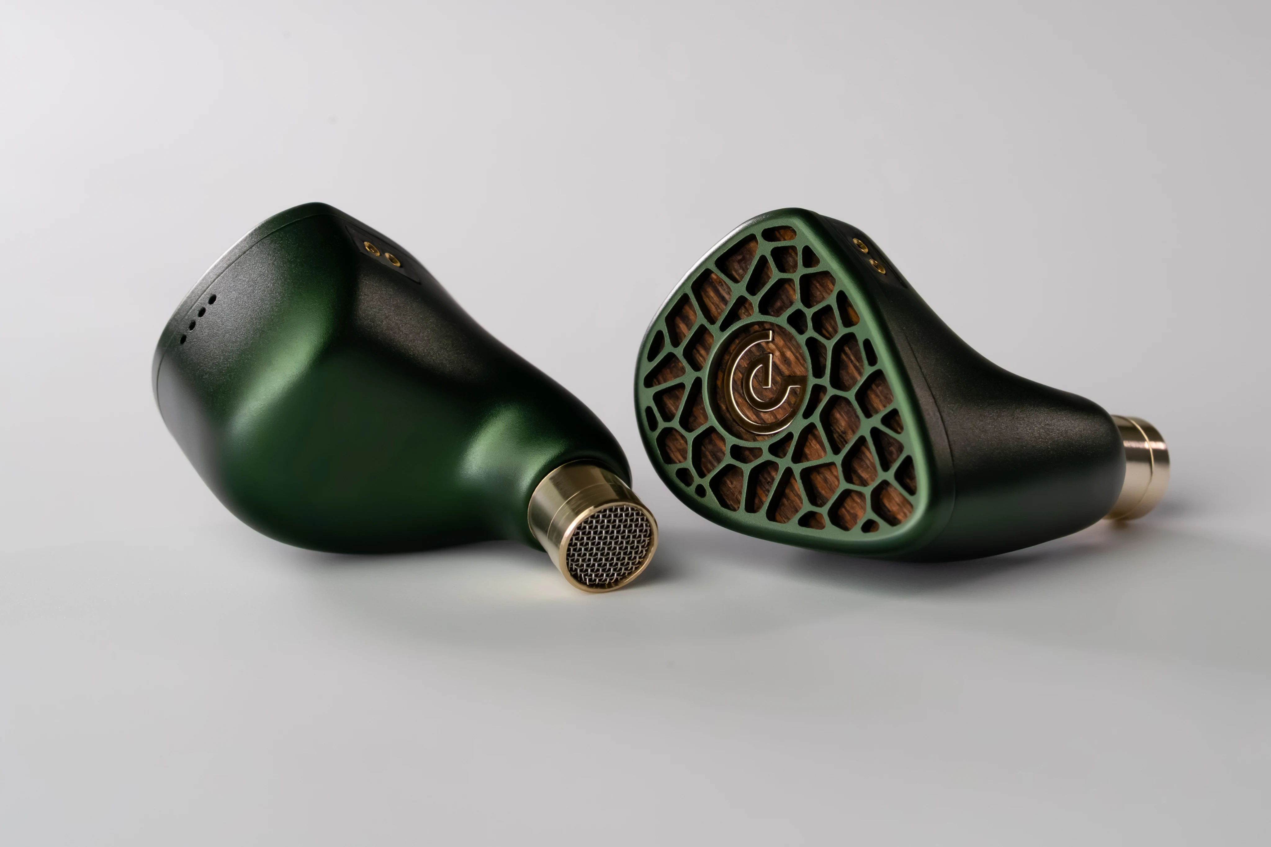 A pair of Leszy shells with their bronze nozzles